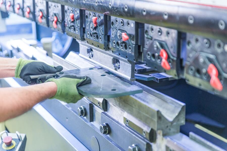 Sheet metal bending process using an Amada press brake at Metal Design